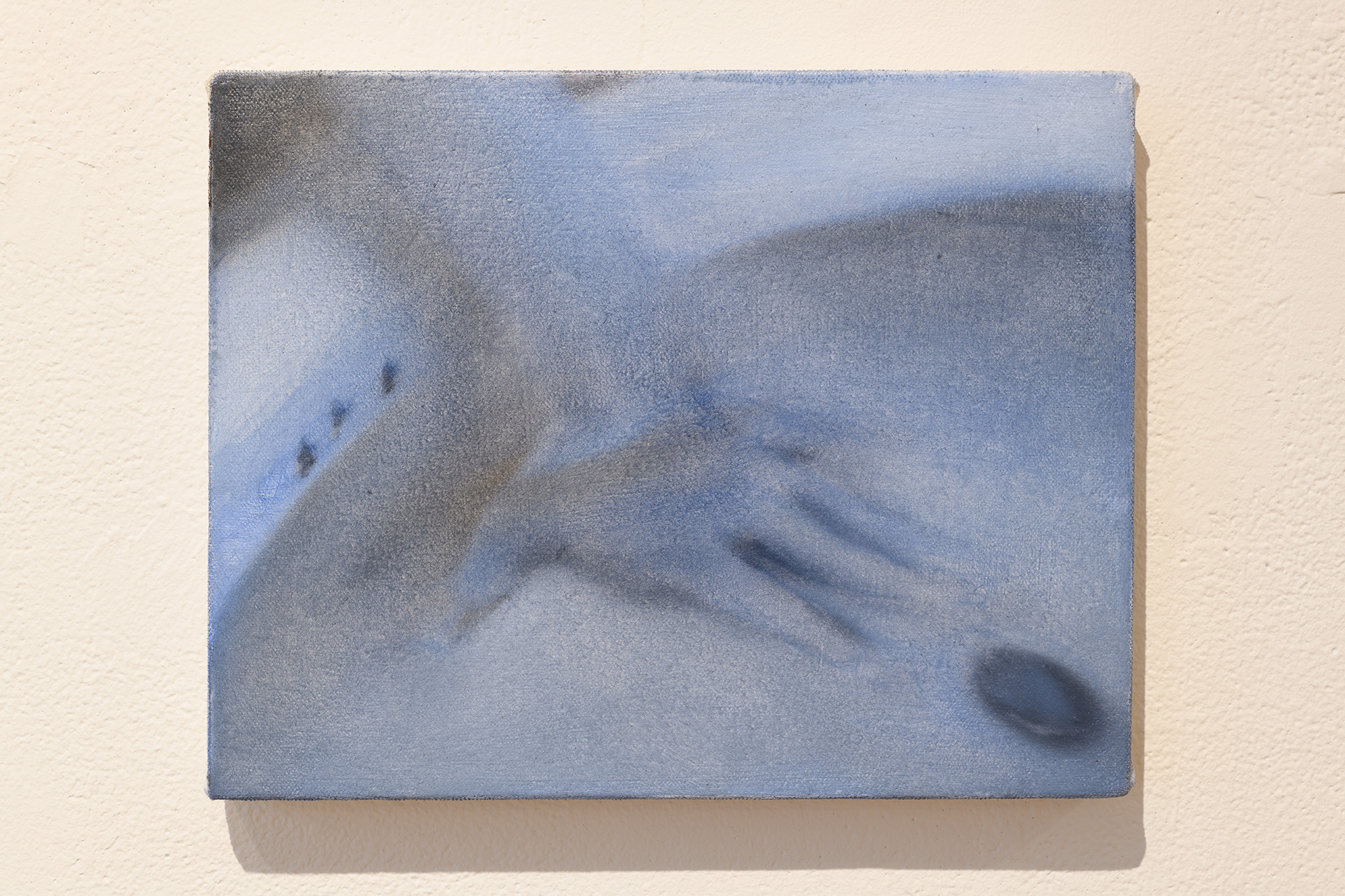 [A small painting showing a hand pressing its palm down into the basin of a bathroom sink. The sink’s drain also looks like a belly button or a bodily orifice and the hand, arm, and sink are rendered in the same blue-gray manner.]