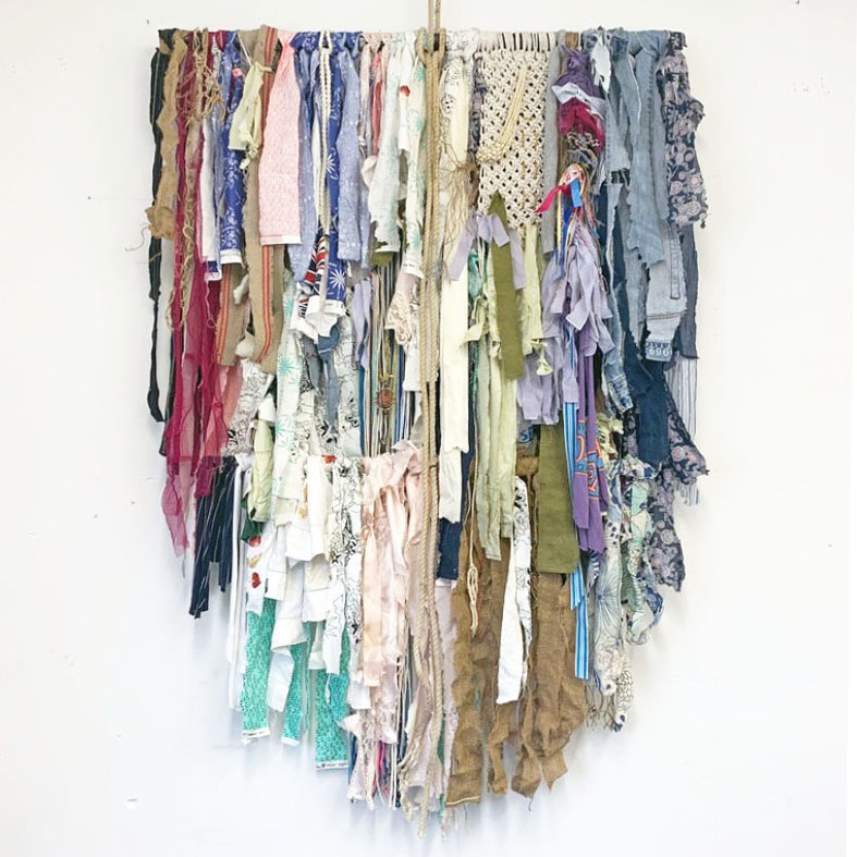 Covid Weaving, 2020, textile scraps from family and friends in quarantine, 3 ft, x 6 in, x 4 ft.