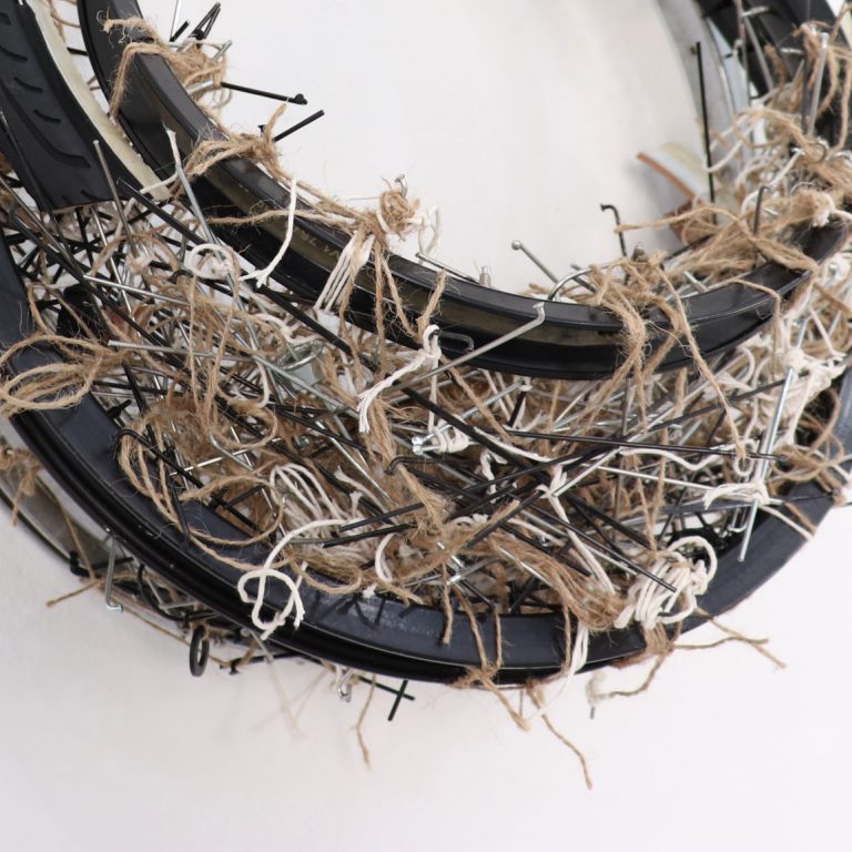 Nest, 2020, three bike rims, tires, spokes, twine, 2 ft, x 1 ft, x 2 ft.